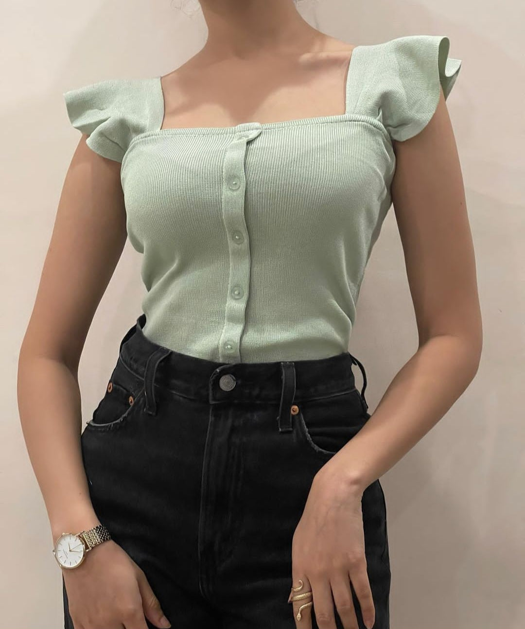 Pale green ribbed top