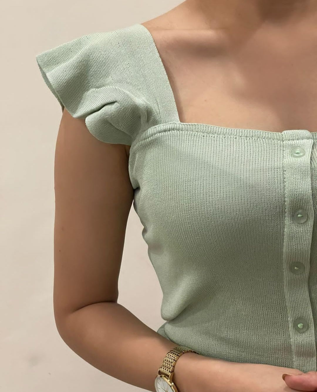 Pale green ribbed top