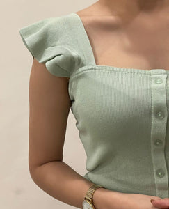 Pale green ribbed top