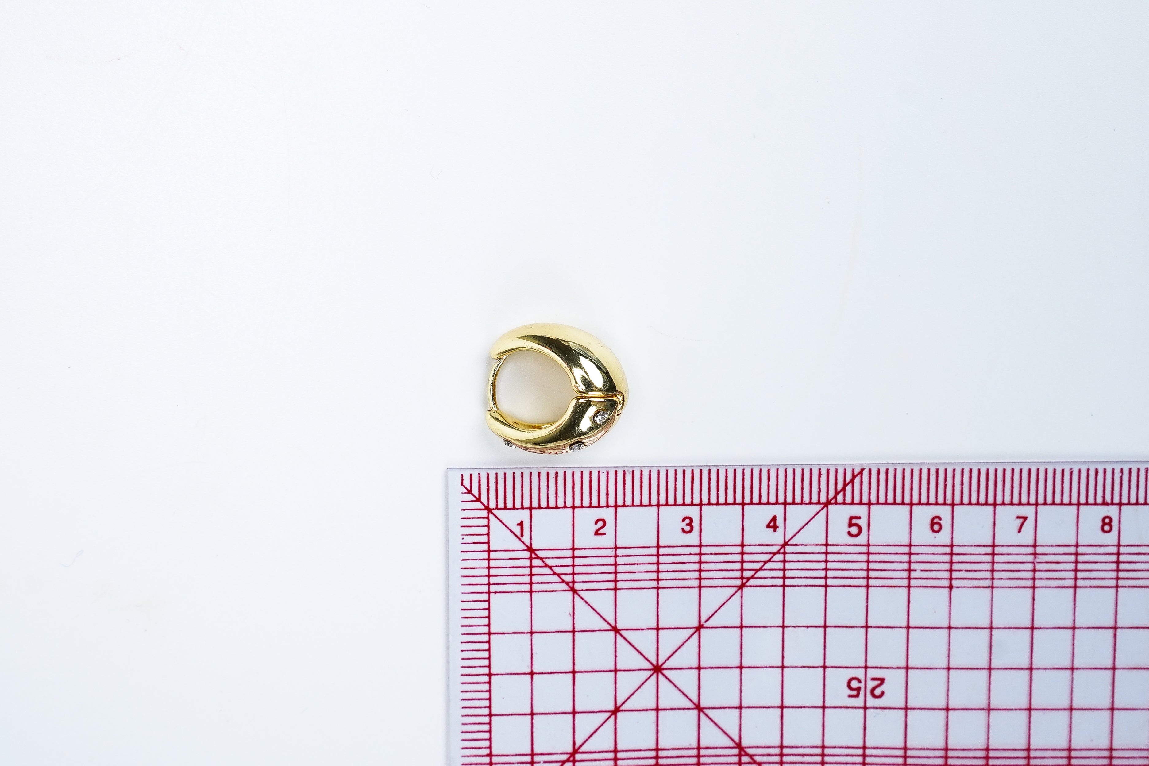 Gold Star Huggie drop earrings