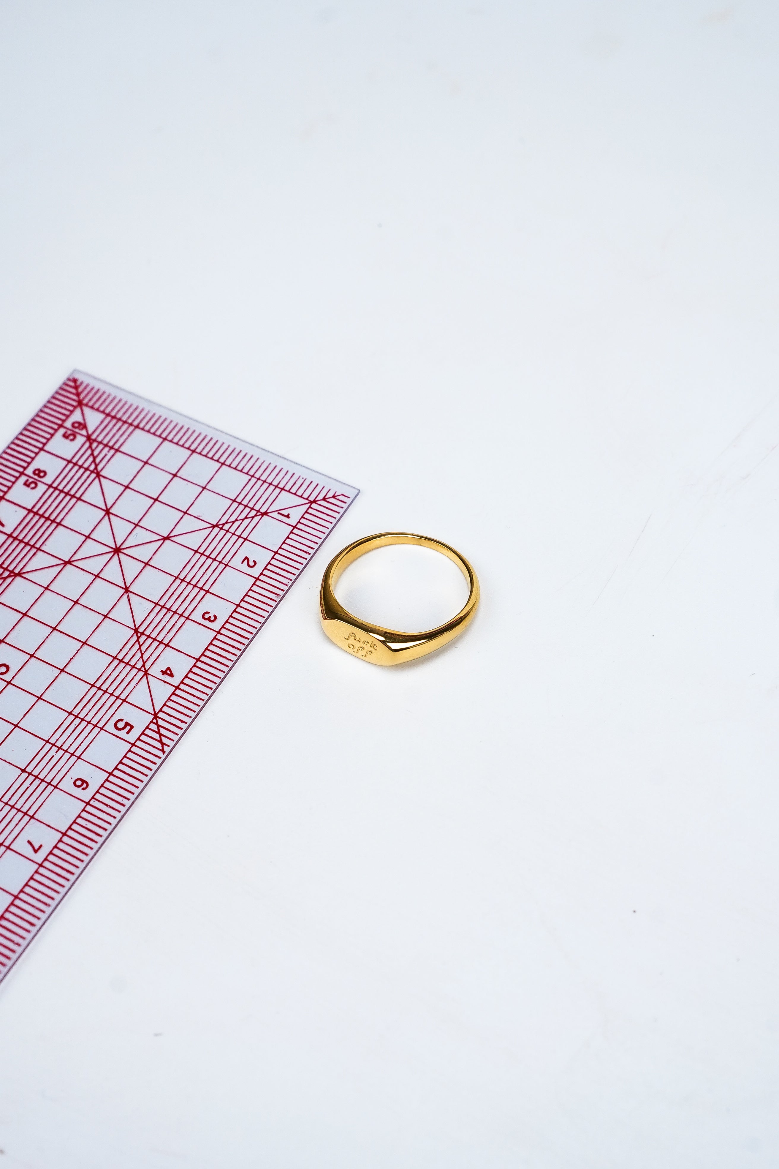 "Fuck Off" engraved ring